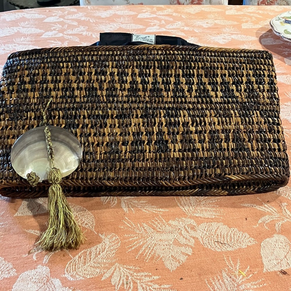 Mister Ernest Woven Brown Straw Clutch with Shell Tassel